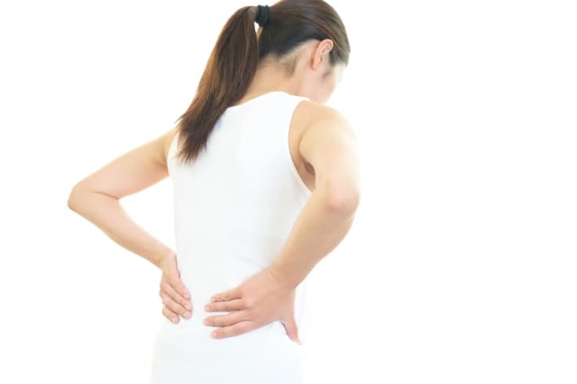 腰に手をあてている写真